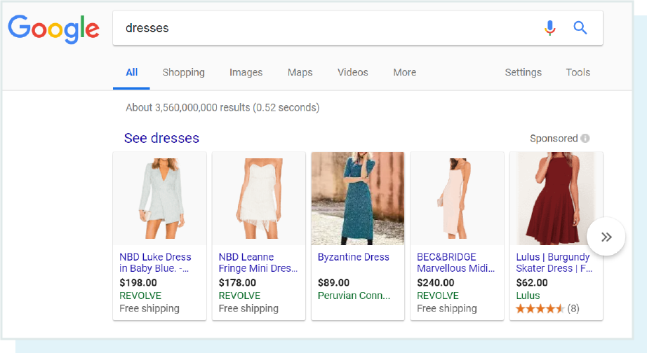 A screenshot of the query 'dresses' and resulting carousel.